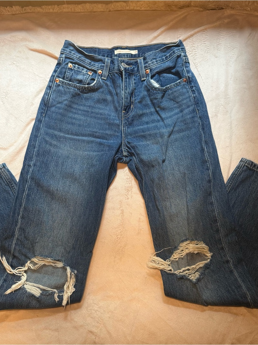 Levi’s Low Pro Dark Wash Distressed Denim in a Size 25